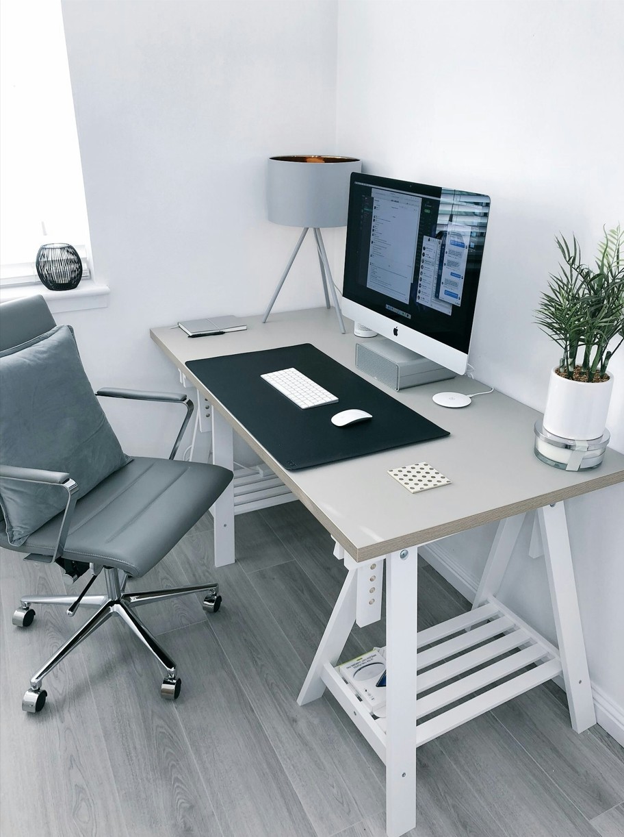 Organized office space with cleaning supplies